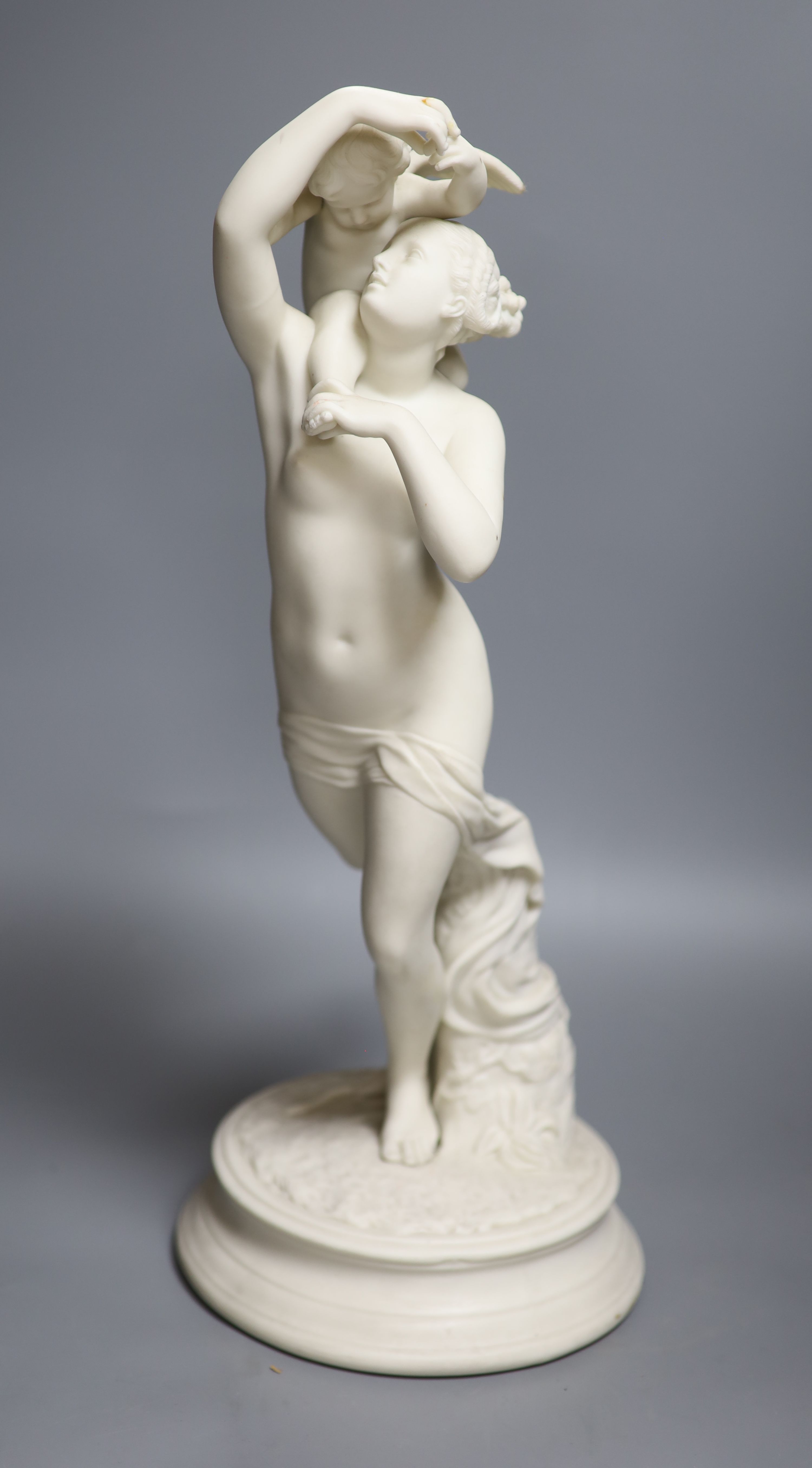 After C.A. Fraikin. A Victorian parian group, Diana and Cupid, height 46cm
